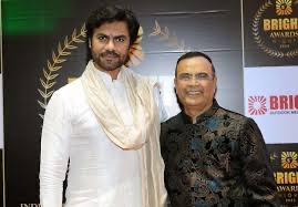 Yogesh Lakhani welcoming a guest at the Bright Awards Night