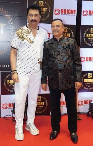 Yogesh Lakhani with a guest on the red carpet at the Bright Awards Night
