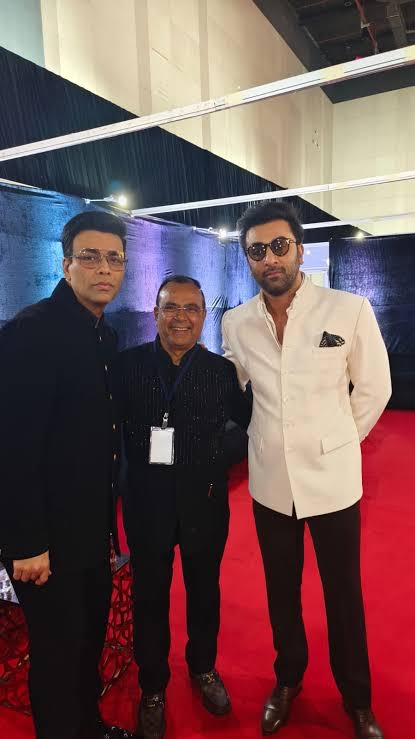 Yogesh Lakhani with guests at an industry gathering
